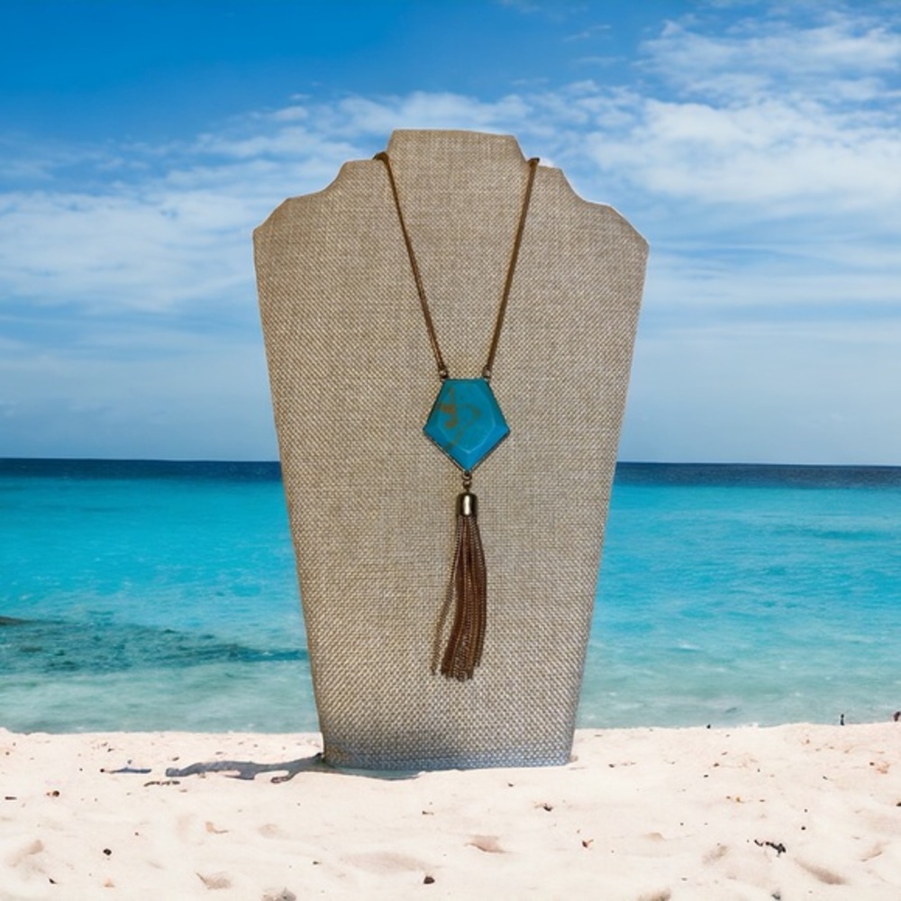 Long statement necklace. Turquoise color with gold tone hardware